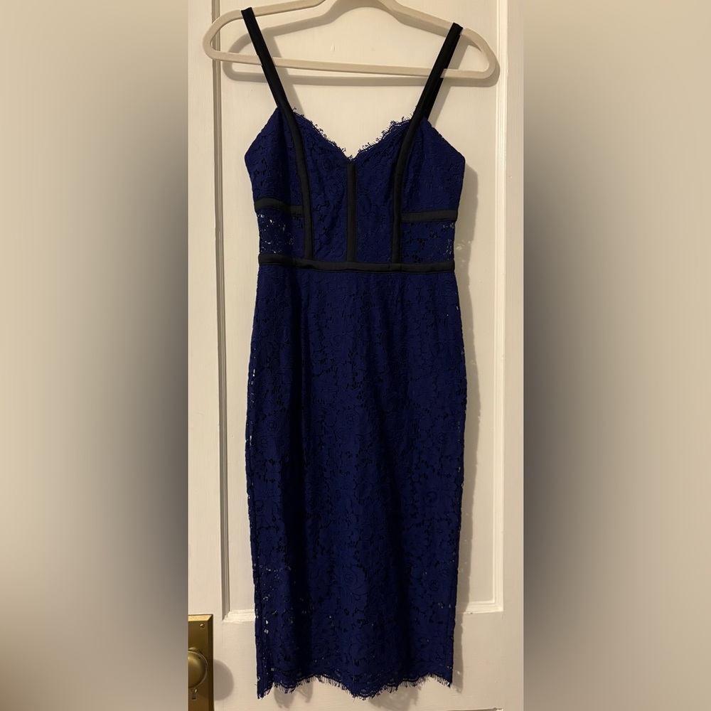 Express Blue Lace Cocktail Dress with Black Trim and Peekaboo Cutouts